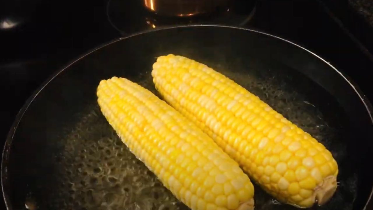 If using fresh corn, remove the husks and silk. If using frozen corn, no preparation is needed. Place the sweet corn in a pot with enough water to cover it. Cover and steam for 20-30 minutes until tender. In a skillet, heat a little butter over medium heat. Add your choice of green vegetables and sauté until they are tender but still vibrant in color. Season with salt and pepper to taste. If desired, add a splash of cream for richness. 